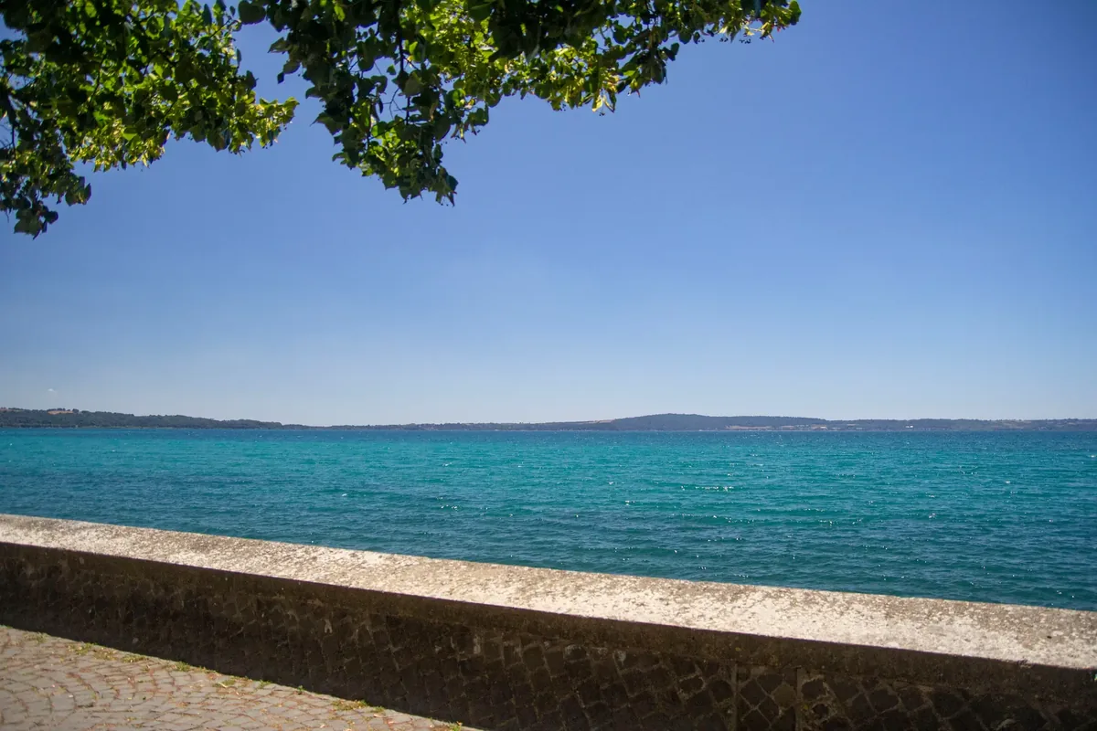 The waters of Lake Bracciano and the lakeside promenade at Trevignano Romano